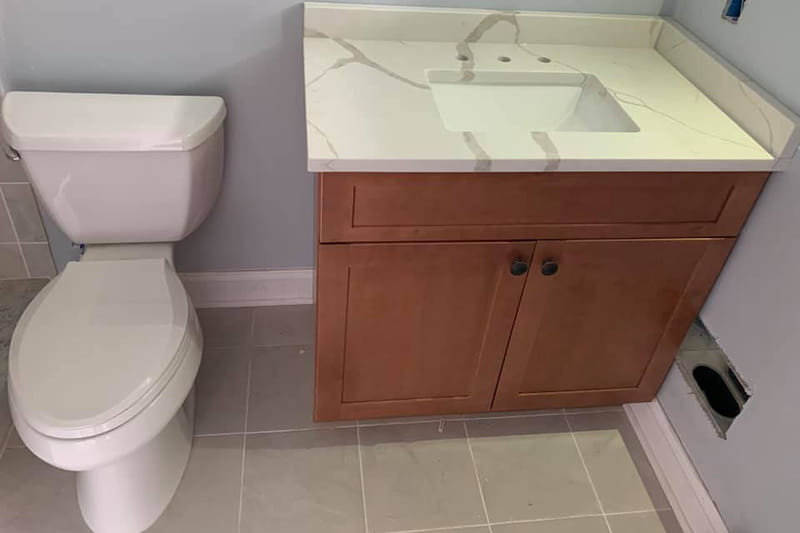Durable stone bathroom countertop custom fabricated for New Jersey home