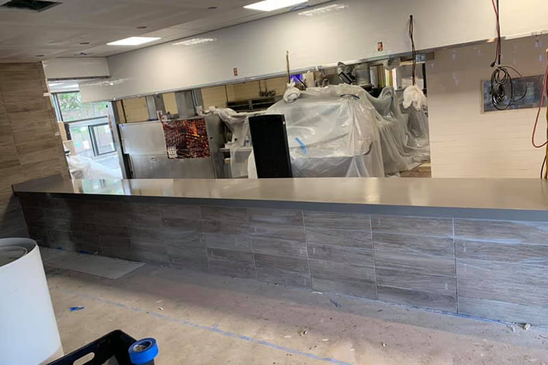 Professional commercial countertop installation featuring durable quartz surfaces in a New Jersey business